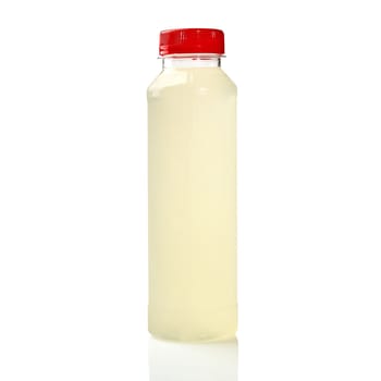 Plastic bottle with red cap of sweet and sour ginger lemonade with slight spicy bitterness isolated on white background. Traditional Japanese drink for sushi rolls. Popular food accompaniment concept