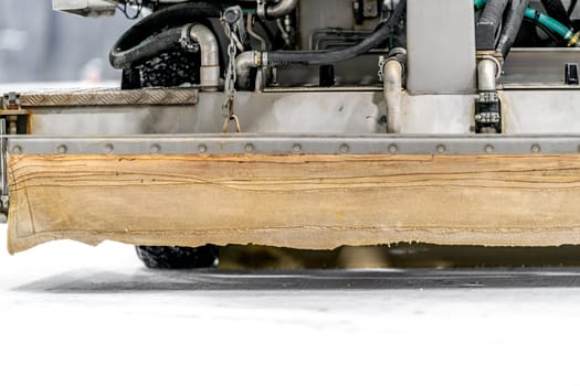 detail of the machine for resurfacing the ice surface at the hockey winter stadium. High quality photo