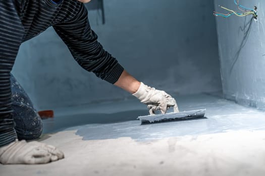 waterproofing of the bathroom floor in a new building.