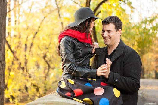 Beautiful gourgeous caucasian couple in autumn park