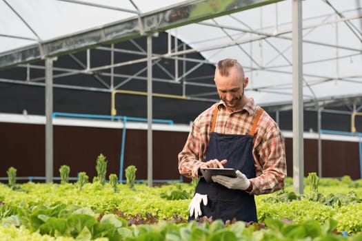 Farmer checking quality by tablet agriculture modern technology. Concept using modern technologies in agriculture