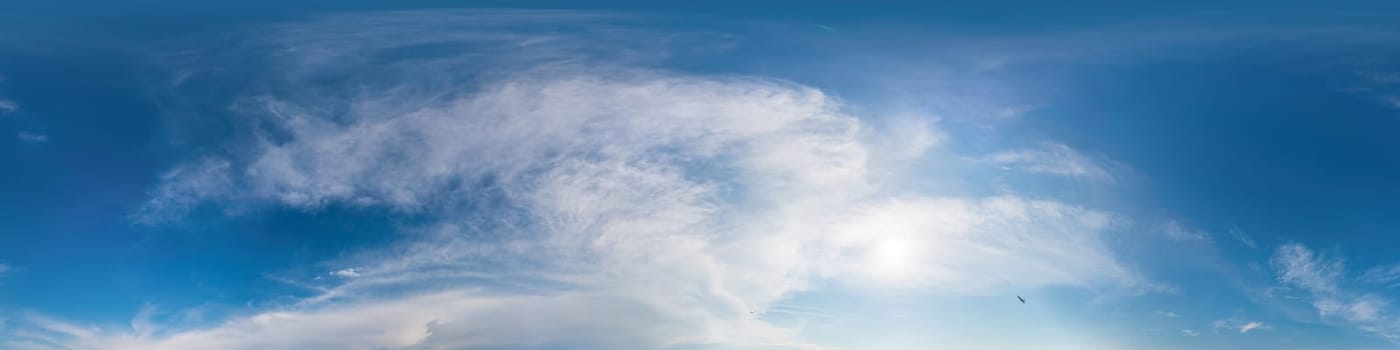 Sky panorama with Cirrus clouds in Seamless spherical equirectangular format. Full zenith for use in 3D graphics, game and editing aerial drone 360 degree panoramas for sky replacement