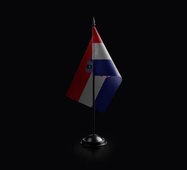 Small national flag of the Croatia on a black background.