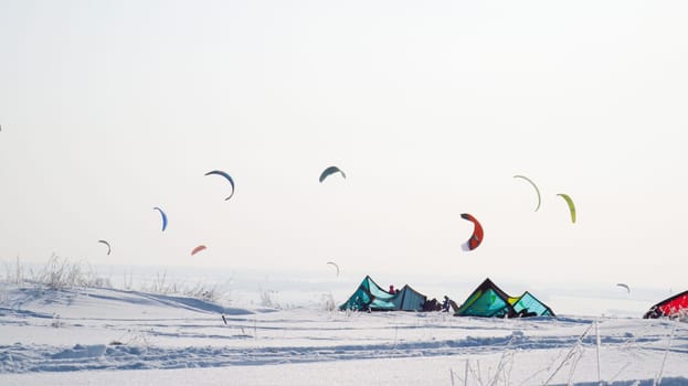 A lot of people do snowkiting. Parachuting in snowy terrain. Winter tents.