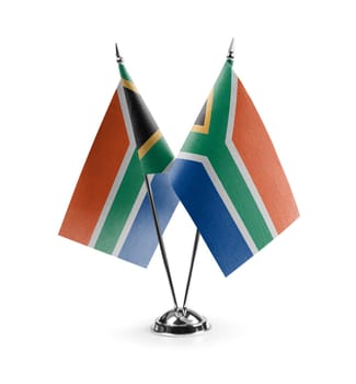 Small national flags of the South Africa on a white background.