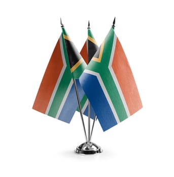 Small national flags of the South Africa on a white background.