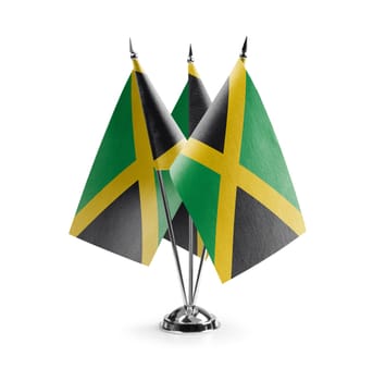 Small national flags of the Jamaica on a white background.