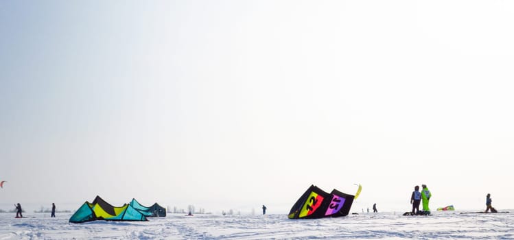 A lot of people do snowkiting. Parachuting in snowy terrain. Winter tents.