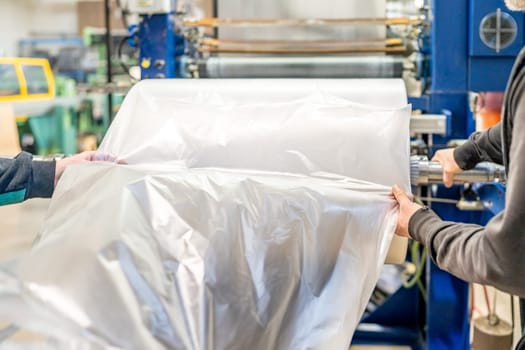 large plastic roll in the factory for the production of plastic packaging material and bags. 
