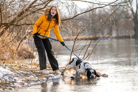 teenager with a dog on a walk in the park. High quality photo