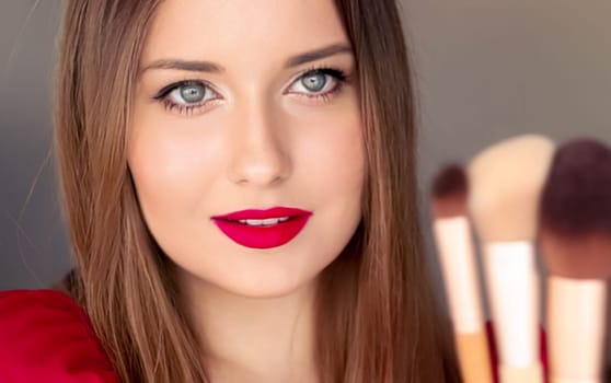 Beauty, makeup and cosmetics, face portrait of beautiful woman with make-up brushes, luxury cosmetic product, makeup artist or beauty blogger concept.