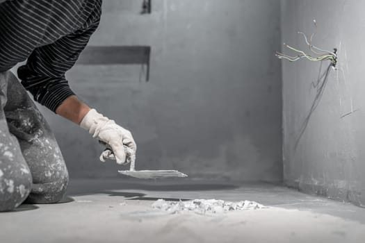 masonry work with a trowel on the construction site. High quality photo