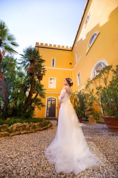 Stylish young bride on her wedding day in Italy.elegant Bride from Tuscany.Bride in a white wedding dress.