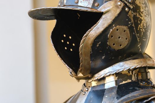 An ancient Knight's helmet with armor.A medieval concept.