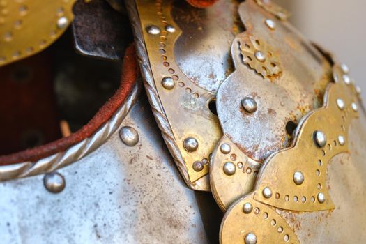 Parts of ancient knight's armor.A medieval concept.Metallic texture.