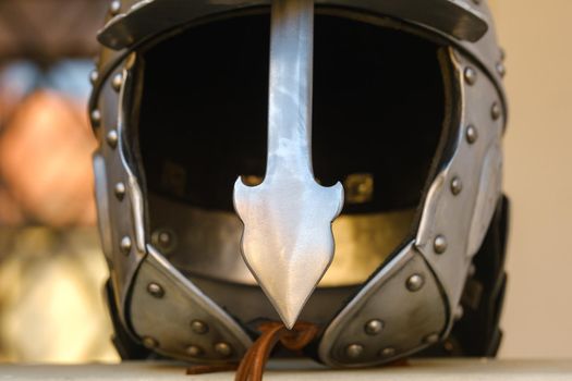 An ancient Knight's helmet with armor.A medieval concept.