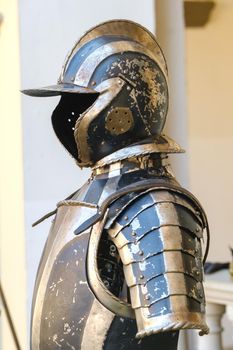 An ancient Knight's helmet with armor.A medieval concept.