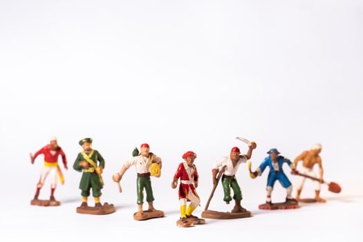 Vintage pirate toys isolated on white background.