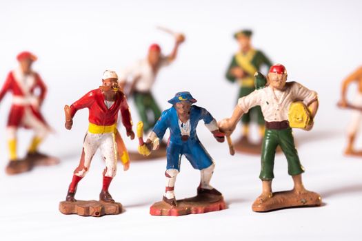 Vintage pirate toys isolated on white background.