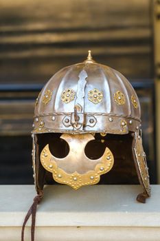 An ancient Knight's helmet with armor.A medieval concept.