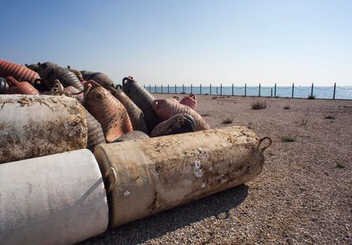 Old boa next to the sea, Villaggio del Pescatore. Italy