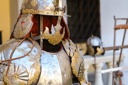 An ancient Knight's helmet with armor.A medieval concept.