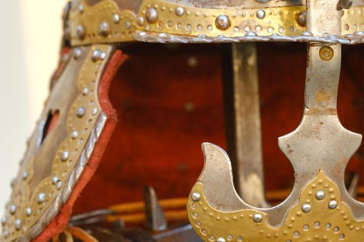 An ancient Knight's helmet with armor.A medieval concept.