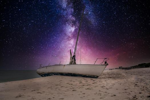 Milky way in the night sky over a shipwreck off the coast of Clam Pass in Naples, Florida