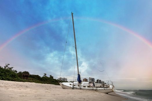 Rainbow over a shipwreck off the coast of Clam Pass in Naples, Florida