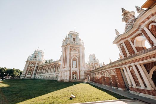 Grand Palace in Tsaritsyno in summer, Russia. Tsaritsyno Park is one of the main tourist attractions in Moscow. Beautiful scenic view of the old Tsaritsyn complex in summer.