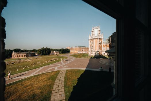 Grand Palace in Tsaritsyno in summer, Russia. Tsaritsyno Park is one of the main tourist attractions in Moscow. Beautiful scenic view of the old Tsaritsyn complex in summer.