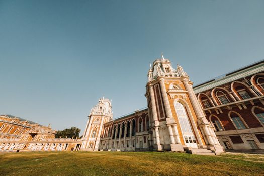 Grand Palace in Tsaritsyno in summer, Russia. Tsaritsyno Park is one of the main tourist attractions in Moscow. Beautiful scenic view of the old Tsaritsyn complex in summer.