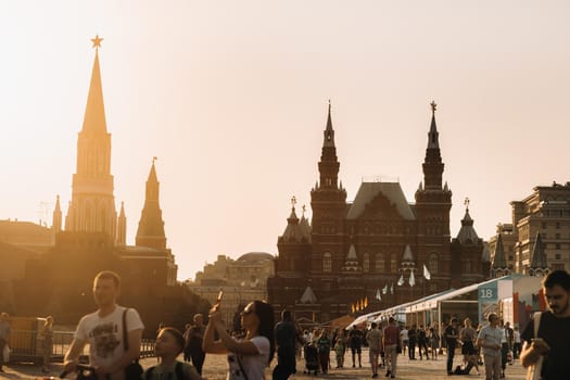 June 6, 2019.Red Square, Moscow, Russia.Kremlin towers and tourists on Red Square at sunset in Moscow.