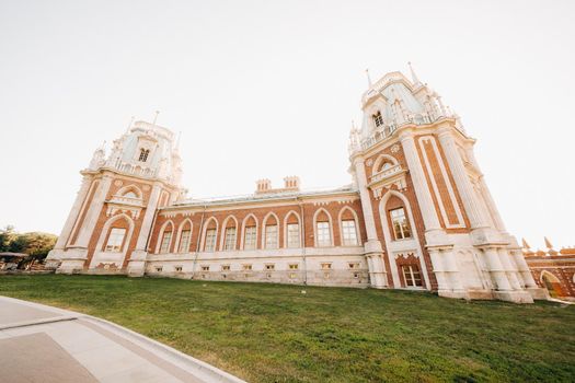 Grand Palace in Tsaritsyno in summer, Russia. Tsaritsyno Park is one of the main tourist attractions in Moscow. Beautiful scenic view of the old Tsaritsyn complex in summer.