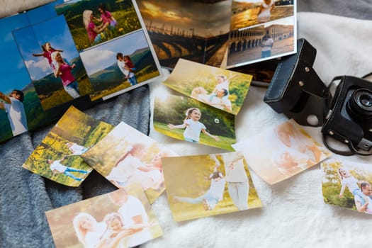 Family photos archive saved in brightly designed photo book; bright summer memories placed in the photobook