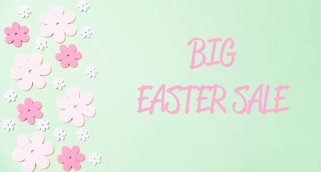 text Big easter sale on a pink background. High quality photo