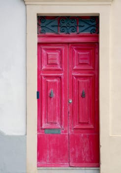 close up retro style old house door of Mediterranean architectural culture in Mediterranean island Malta. High quality photo