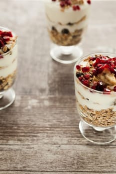 Home made muesli on wooden background. Food photography