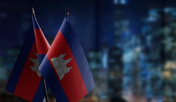 A small Cambodia flag on an abstract blurry background.