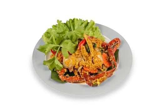 Stir Fried crab seafood with Garlic, Pepper, Curry Powder and vegetable on dish