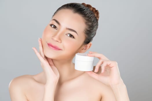 Glamorous beautiful perfect cosmetic skin with soft makeup woman portrait hold mockup jar cream or moisturizer for skincare treatment and anti-aging product advertisement in isolated background.