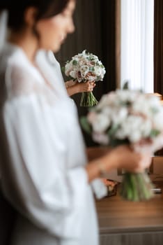 morning of the bride with the creation of the image of makeup and the creation of hairstyles