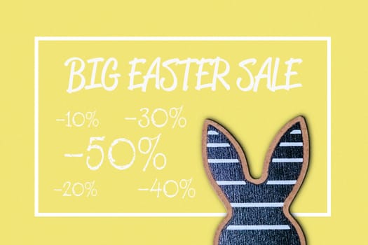 creative banner with easter black hare on bright yellow background with text. Flat lay.Minimal concept. 