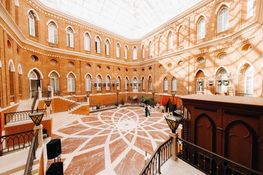 Grand Palace in Tsaritsyno in summer, Russia. Tsaritsyno Park is one of the main tourist attractions in Moscow. Beautiful scenic view of the old Tsaritsyn complex in summer.