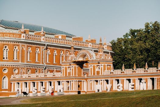 Grand Palace in Tsaritsyno in summer, Russia. Tsaritsyno Park is one of the main tourist attractions in Moscow. Beautiful scenic view of the old Tsaritsyn complex in summer.