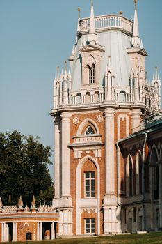 Grand Palace in Tsaritsyno in summer, Russia. Tsaritsyno Park is one of the main tourist attractions in Moscow. Beautiful scenic view of the old Tsaritsyn complex in summer.