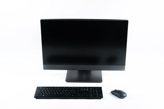 monoblock with keyboard and mouse on a white background.The computer is on white isolate.