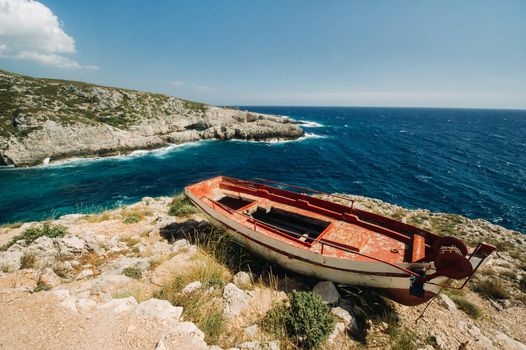 The rocky Porto Limnionas beach on Zakynthos island, Greece.
