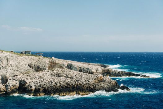 The rocky Porto Limnionas beach on Zakynthos island, Greece.