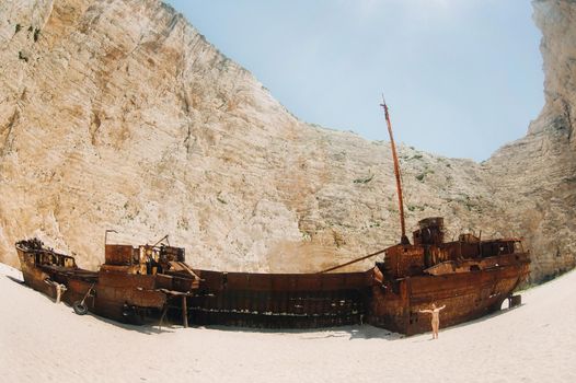 curved ship on Zakynthos island, Greece Navagio beach, or shipwreck beach,sometimes called smugglers ' Bay , on the coast of Zakynthos island, in the Ionian Islands of Greece